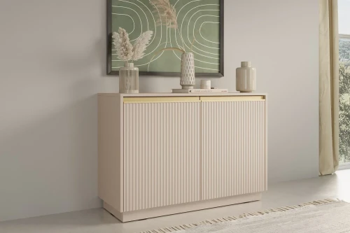 Beżowa komoda dwudrzwiowa Resto ze złotymi akcentami