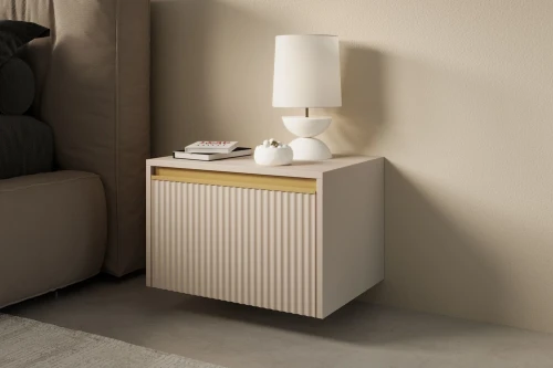 Beżowy stolik nocny Resto z szufladą i złotymi akcentami wiszący